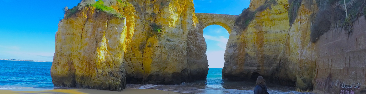 TJ admiring the beach rock formations Praia da Rocha